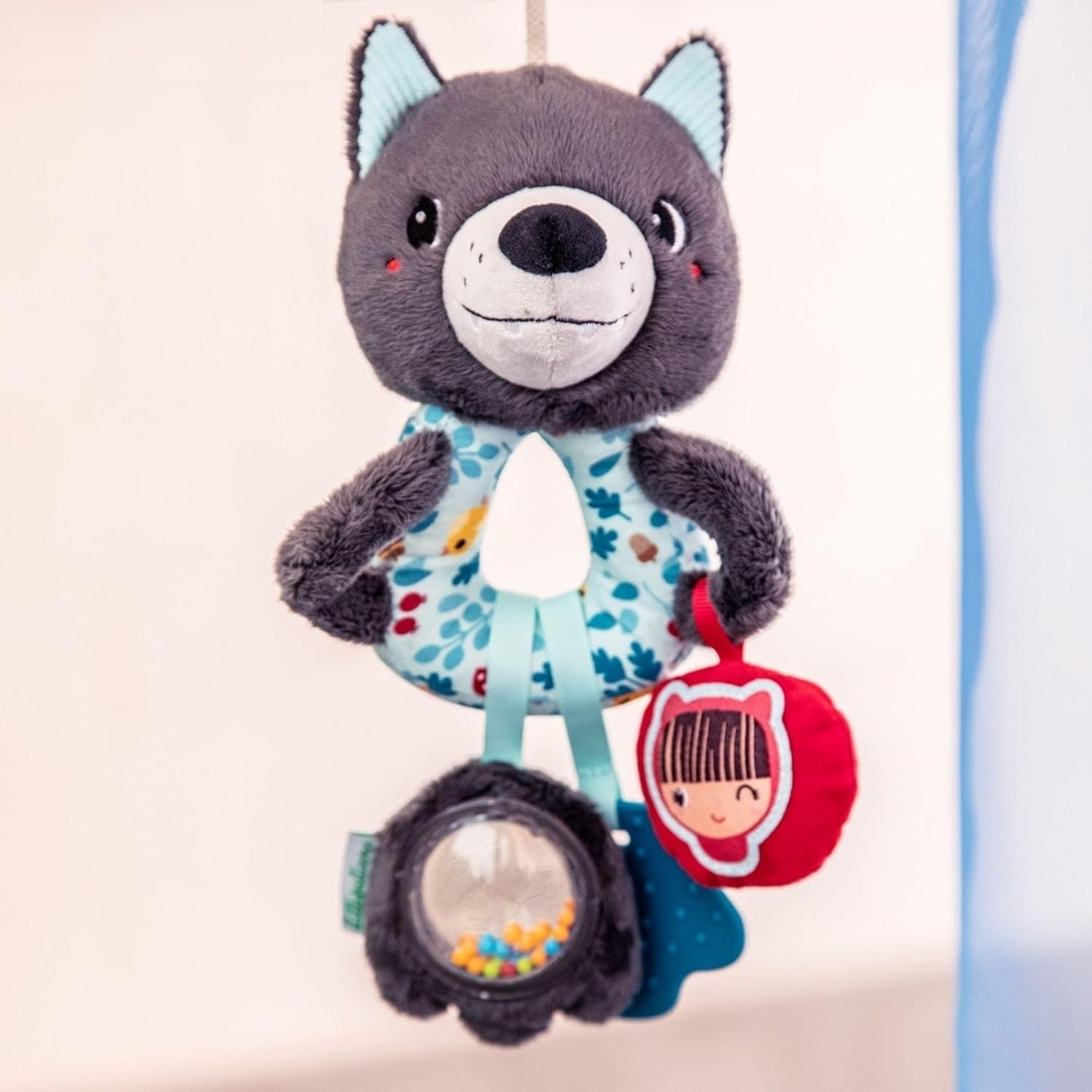 Lilliputiens - Louis de Wolf multifunctionele ringen - Rammelaar voor baby's met geluiden, texturen en kleuren - Gemakkelijk te vangen - Stimuleert de zintuigen en bevordert de motoriek - Vanaf 3 maanden - 83505 Jucarii Bebe Naty Shop