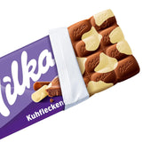 Milka Koeienvlekken – Alpenmelkchocolade met witte chocolade in koevlekkenmotief – 24 x 90 g