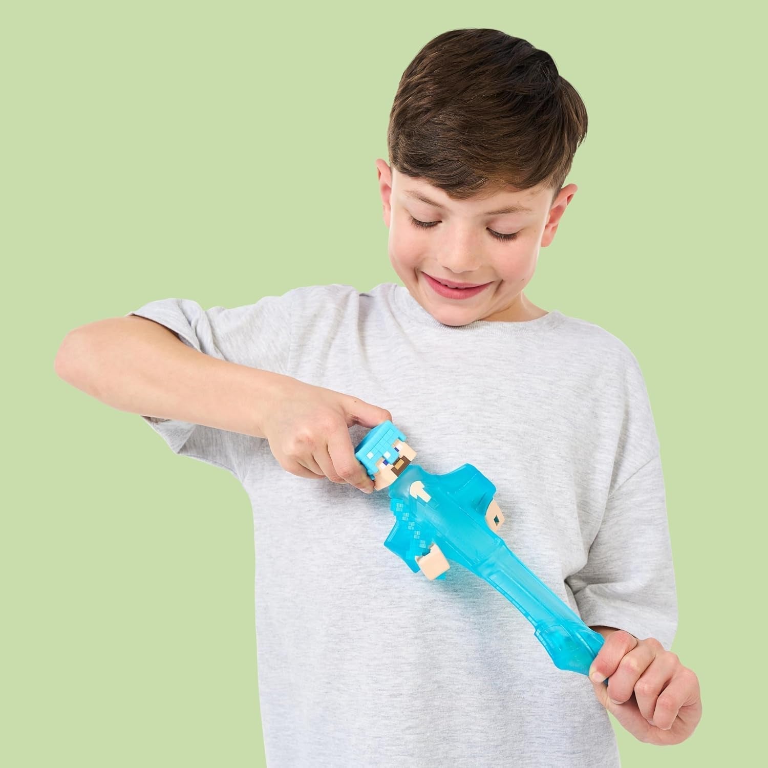 Heroes of Goo Jit Zu - Uitbreidbaar Minecraft-figuur - Steve met diamanten pantser en zwaard, super rekbare Goo Filler met verborgen diamantelement erin, uitbreidbaar tot actiefiguren van 3x formaat Naty Shop