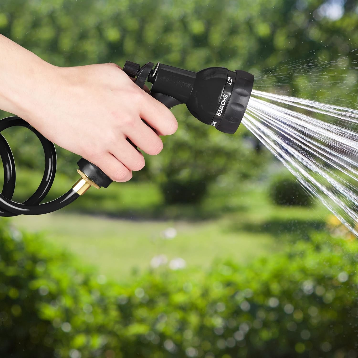 Relaxdays spiraalslang verlengbaar tot 10m flexibele tuinslang met watersproeier 7 spuitpatronen zwart