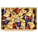 Kleurrijk Lindt Chocolade Paasnest | 310 gram | 8 x mini gouden konijntjes, 26 x Lindor eieren van melkchocolade, 15 x Lindor eieren van witte chocolade, 10 x Lindor eieren van pure chocolade | Paaschocolade | Geschenk van chocolade