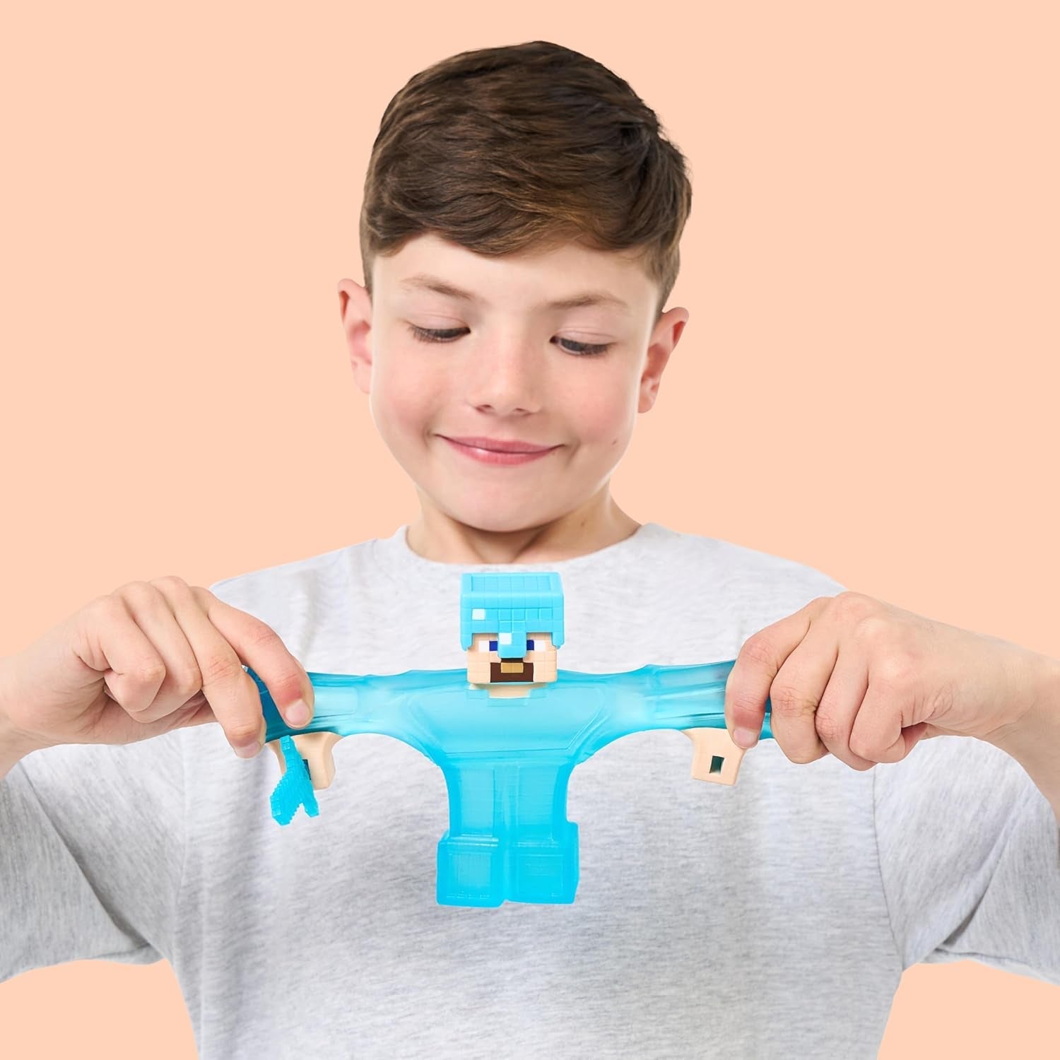 Heroes of Goo Jit Zu - Uitbreidbaar Minecraft-figuur - Steve met diamanten pantser en zwaard, super rekbare Goo Filler met verborgen diamantelement erin, uitbreidbaar tot actiefiguren van 3x formaat Naty Shop