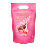 Lindt LINDOR Extra pure chocoladeballetjes en LINDOR Aardbeiencreme chocoladeballetjes | Hersluitbare zak van 1 kg | ca. 80 witte chocoladebolletjes met aardbeiencrème