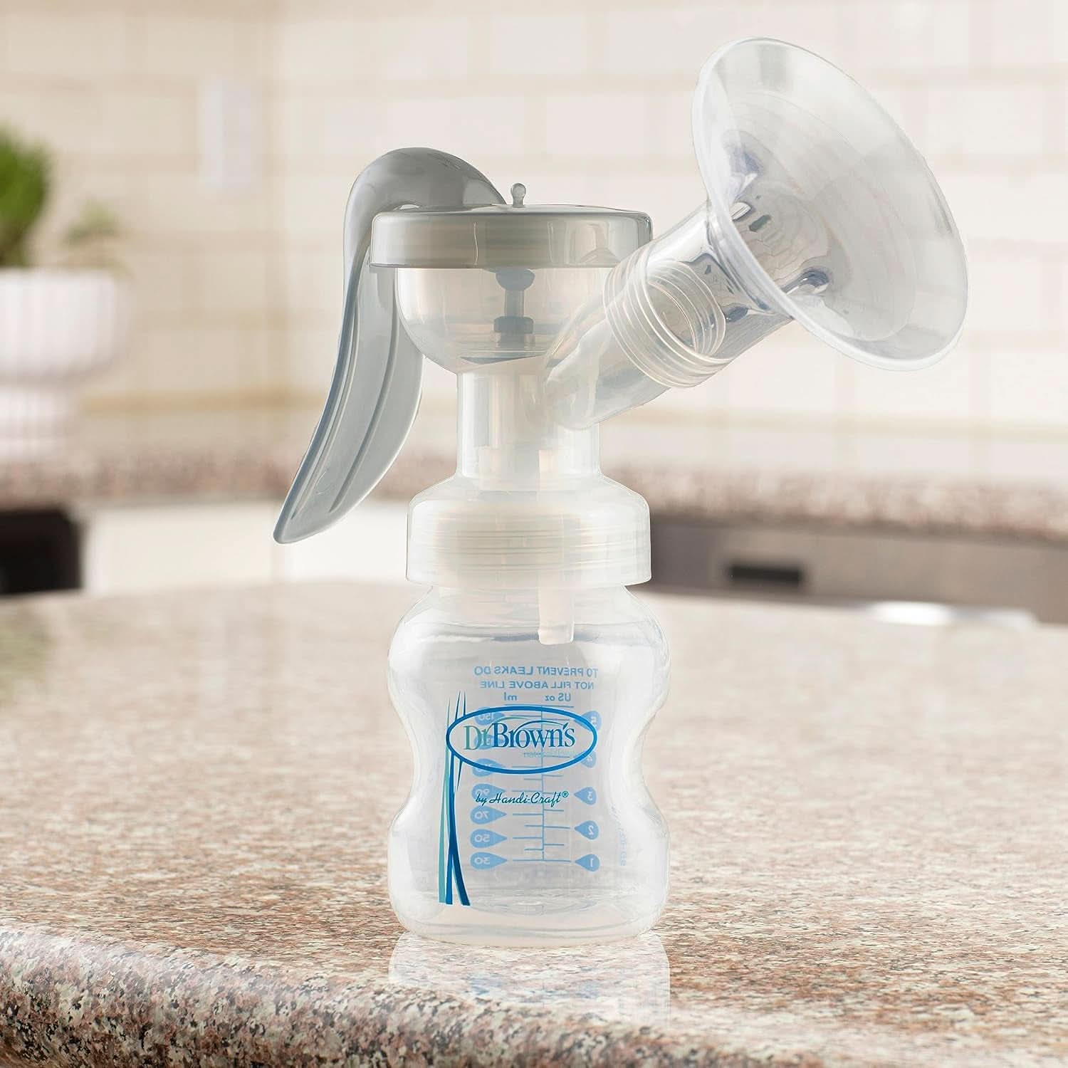 Handmatige borstkolf met 100% siliconen Softshape-bescherming (B, 25 mm flens) en antikrampjesopties + 150 ml fles met brede mond en speen niveau 1 met langzame doorstroming Accessoires Voeding en borstvoeding Bebe Naty Shop