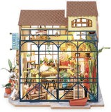 Robotime DG145 Rolife Emily's Flower Shop miniatuur poppenhuis Gemaakt van hout, metaal, stof en karton, afmetingen: 22 x 15 x 17 cm, Naty Shop poppenhuizen