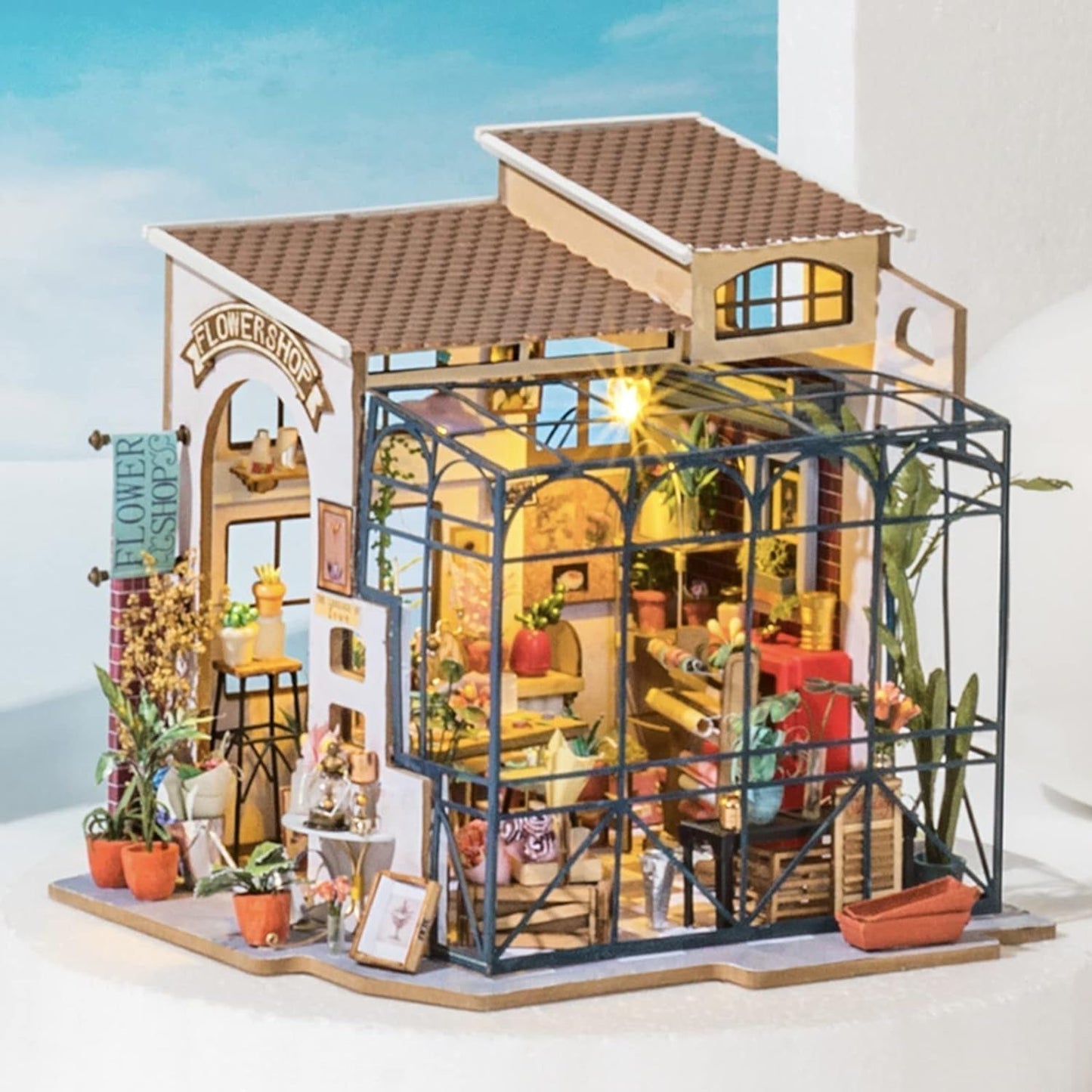 Robotime DG145 Rolife Emily's Flower Shop miniatuur poppenhuis Gemaakt van hout, metaal, stof en karton, afmetingen: 22 x 15 x 17 cm, Naty Shop poppenhuizen