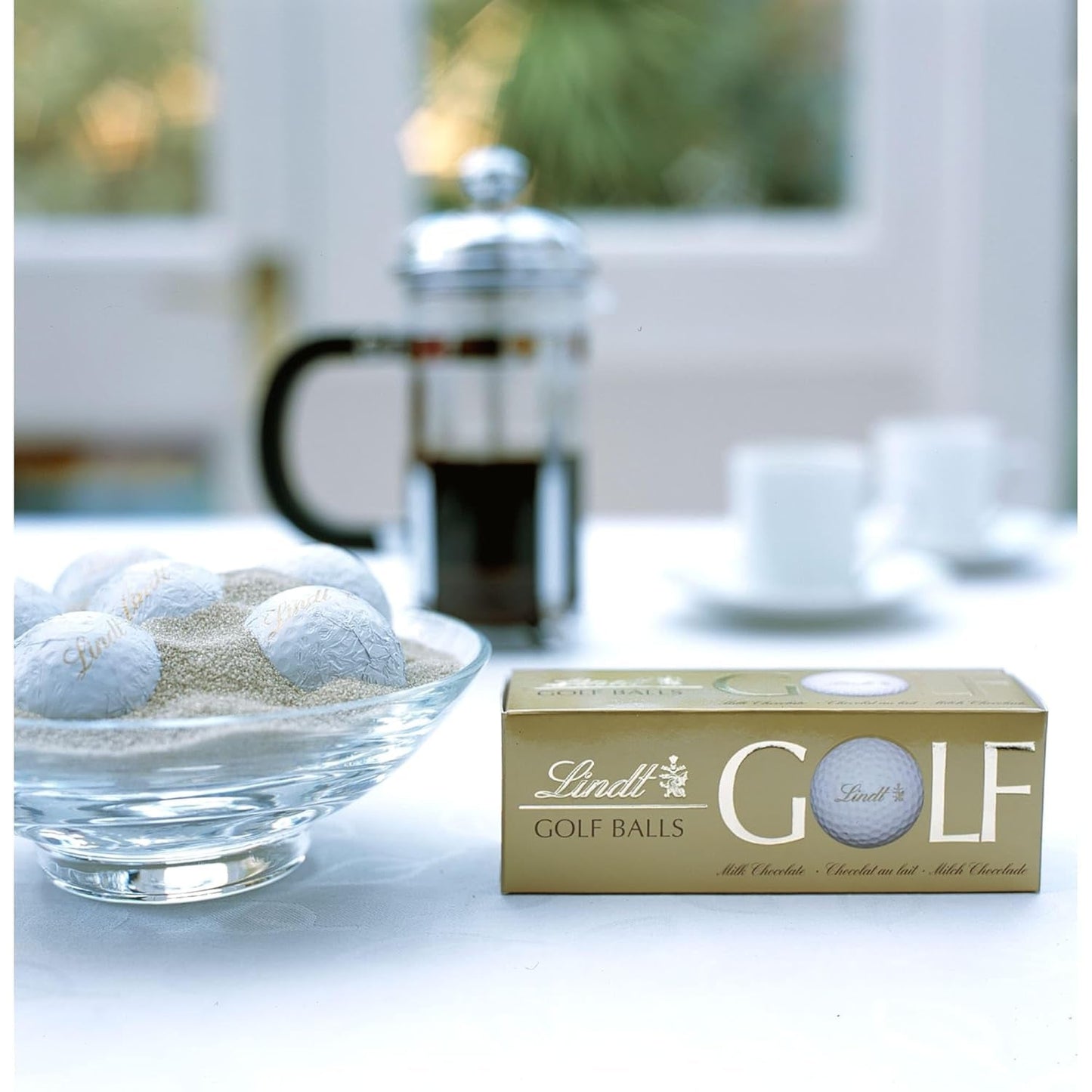 Lindt Schokolade - Golfballen | 110 G| Drei Golfbal Aus Lindt Vollmilch-Schokolade Met Nougatcremefüllung en Waffelstückchen | Pralinnengeschenk | Cadeau voor golfer | Schokoladengeschenk Naty Shop