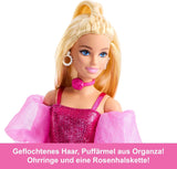 Barbie Deluxe Style #5 pop in een metallic roze blonde outfit met een sprankelend lijfje en een glitterbroek, met accessoires waaronder een roze ketting en een handtas, JFP40