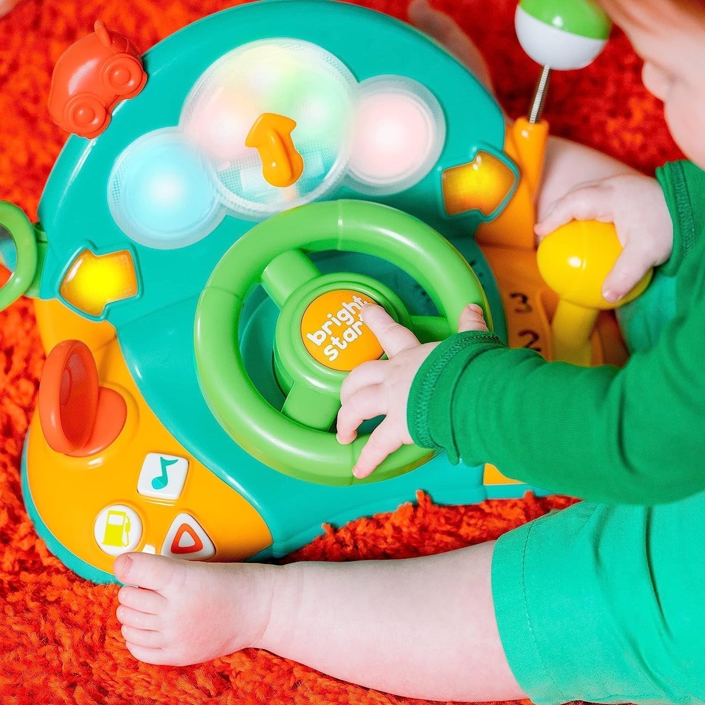Bright Starts, speelgoedstuur, Lights & Colors Driver, met muziek, autogeluiden, richtingaanwijzers, versnellingspook en meer Bebe Naty Shop Speelgoed