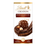Lindt Creation Hazelnoot De Luxe Reep - Pure chocolade met knapperige hazelnoten in een romige vulling
