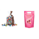 Chocolademix LINDOR | 1371 gram | Ongeveer. 109 bolletjes: Melkchocolade en LINDOR bolletjes met aardbeienroom | Zak van 1 kg, ca. 80 chocoladebolletjes witte chocolade met aardbeiencrème
