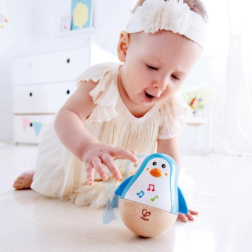 Baby Einstein Magic Touch muzikaal speelgoed met houten trommel, vanaf 6 maanden & Hape Penguin muzikale wobbler, kleurrijke wiebelende melodie, Roly-Poly speelgoed vanaf 6 maanden Bebe Toys Naty Shop