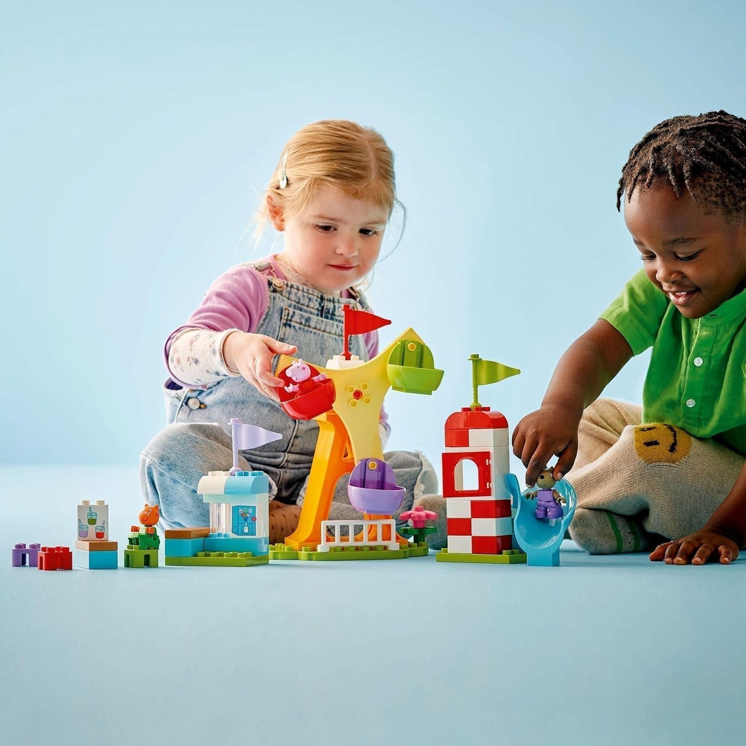 LEGO DUPLO Peppa Wutz Kermis - Kinderspeelgoed en motoriekspeelgoed voor kinderen vanaf 2 jaar - Kleuterspellen met reuzenrad, glijbaan en 3 figuren waaronder Mollie Kitty en Klausi Kläff - Cadeau voor kinderen 10453 Bouwsets Besuche den LEGO-Store