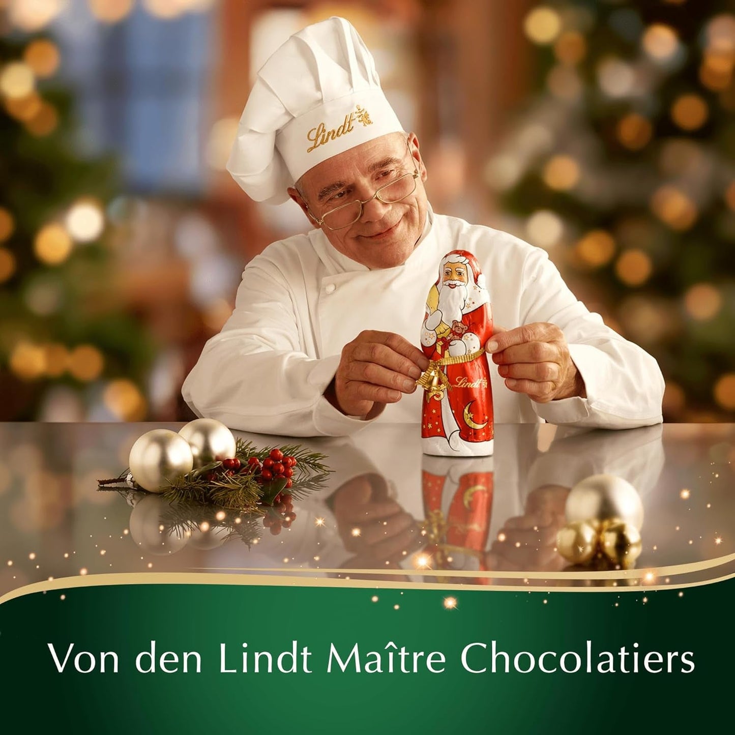 Lindt Kerstamandelchocoladereep | 100 gram | Amandelen in walnotencrème omhuld met de fijnste melkchocolade | Chocolade kerstcadeau