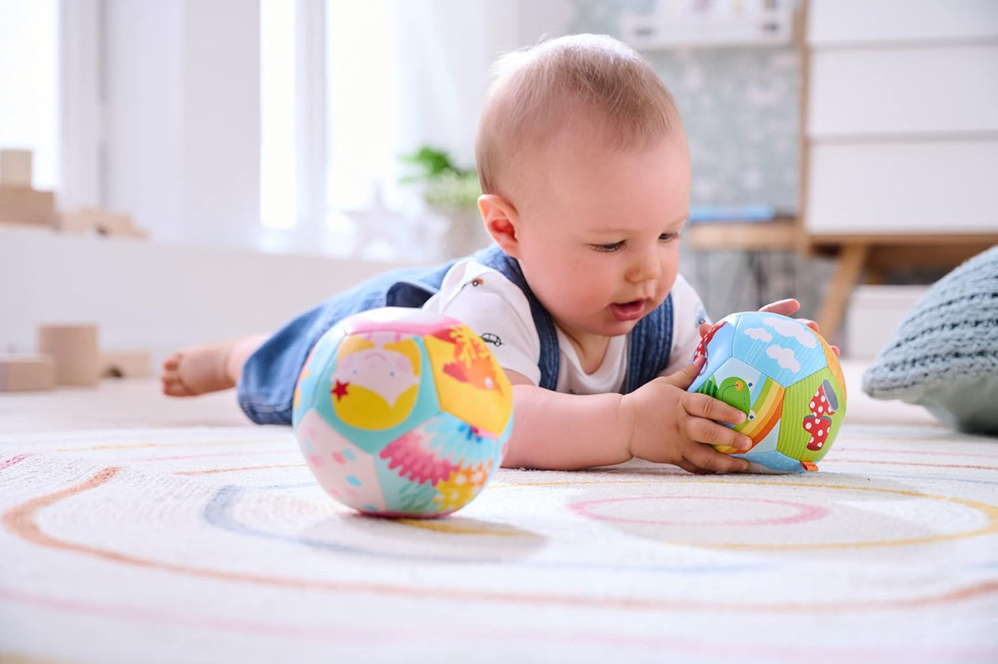 HABA Babybal Rainbow World - Zachte bal vanaf 6 maanden met kleurrijke weermotieven, Ø 11 cm, perfect om de bal voor het eerst te vangen en ermee te spelen - 1306318001 Jucarii Bebe Naty Shop