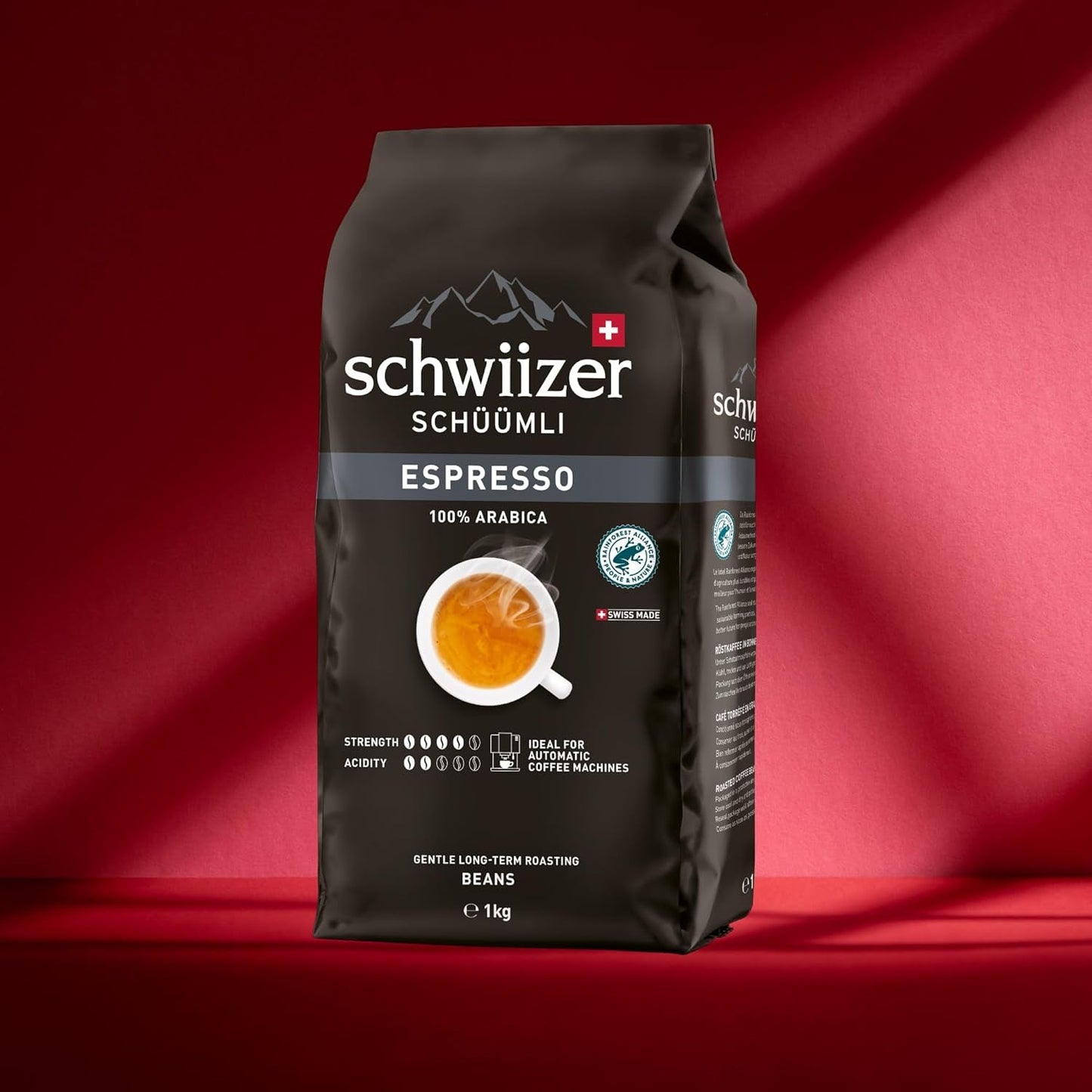Schwiizer Schüümli Espresso, 100% Arabica koffiebonen, sterk en intens, ideaal voor automatische espressomachines, sterkte 4/5, medium branding, Rainforest Alliance, 1kg