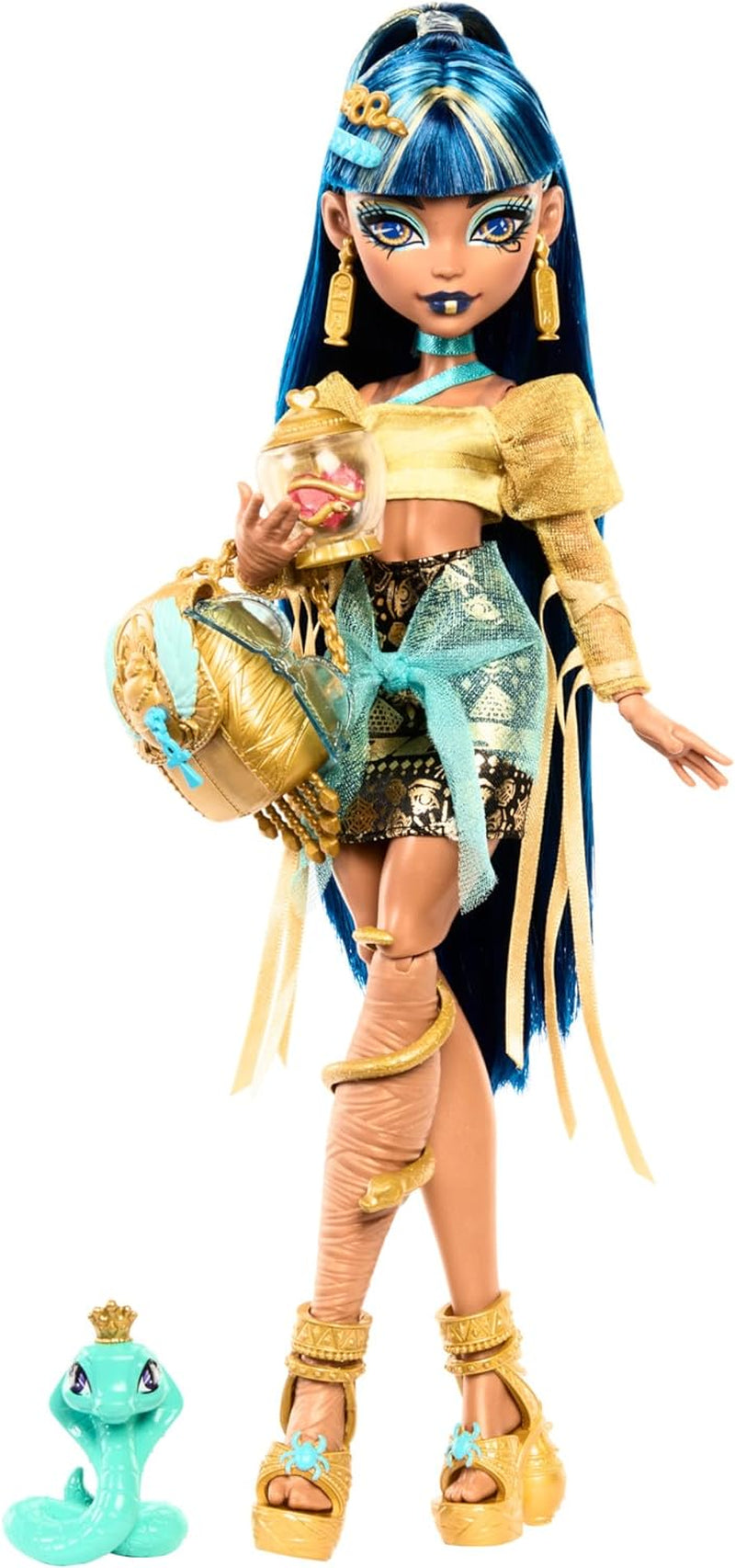 Monster High Cleo De Nile-pop in gouden blouse en gelaagde rok, inclusief de Hissette-cobra en accessoires zoals een schooltas, een snack en een rol toiletpapier, HXH74