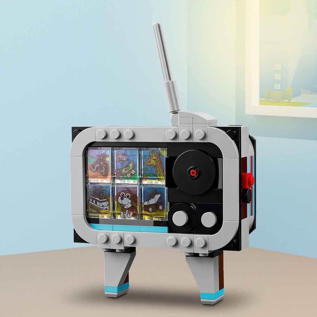 LEGO Creator 3in1 retrocameraspeelgoed, camcorder, tv-toestel, kinderbureaudecoratie of slaapkameraccessoires, fotografiecadeaus voor meisjes en jongens vanaf 8 jaar oud 31147 Bouwsets Bekijk de LEGO-Store