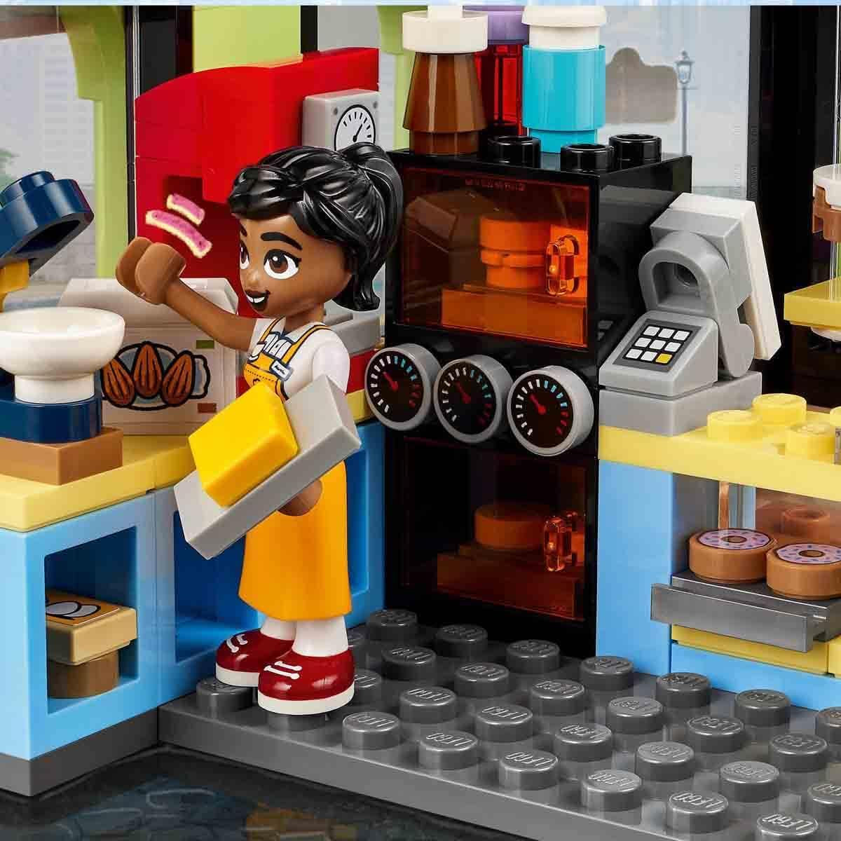 LEGO Friends Heartlake City Café, kinderspeelgoed, speelgoedbakkerij, cadeau-idee voor meisjes en jongens vanaf 6 jaar, set van 3 speelfiguren en hondenfiguur 42618 Bouwsets Besuche in LEGO-Store