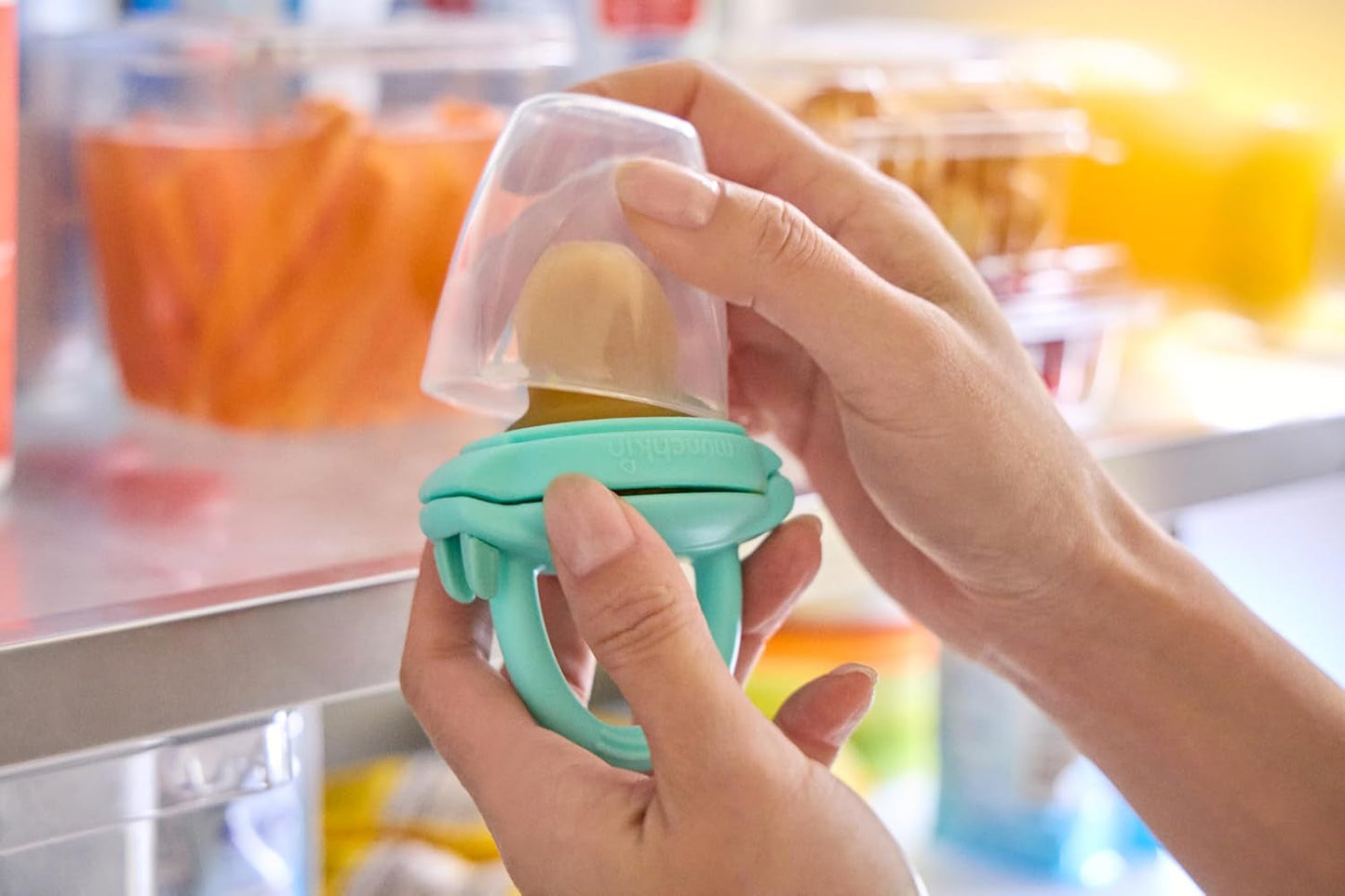 Munchkin Baby Siliconen Voedseldispenser | Ideaal voor onderweg – siliconen zakjes voor diepvriesproducten | Zelfvoedende voedseldispenser | Speenvoeder | BPA-vrij | Vanaf 4 maanden+ | Pak van 2 | Blauw en Groen