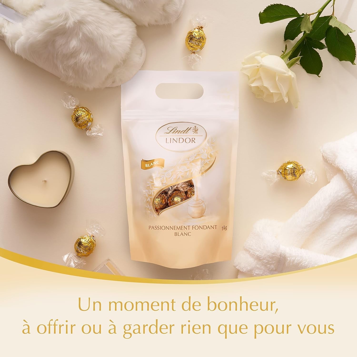 LINDOR witte chocoladebolletjes, 1 kg en LINDOR | Hersluitbare zak van 1 kg | ca. 80 melkchocoladebolletjes met muntvulling | Bulkverpakking, pralinegeschenk, chocoladegeschenk