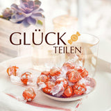 Lindt LINDOR Rood Oranje Chocolade Ballen | Hersluitbare zak van 1 kg | ca. 80 chocoladesnoepjes met smelt-in-je-mond-vulling | Bulkpakket, chocoladecadeau