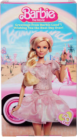 Barbie The Movie Gebaseerd op de film Margot Robbie als Barbie verzamelfiguur in roze blouse en tule rok met gestileerd kapsel en bijpassende sieraden JBJ53