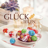 Lindt-chocolade | Diverse tassen LINDOR zilver | Zak van 1 kg | 80 smeltende melkchocoladebolletjes, 70%, gezouten karamel en dubbele chocoladesmaken | Chocoladegeschenk om te delen