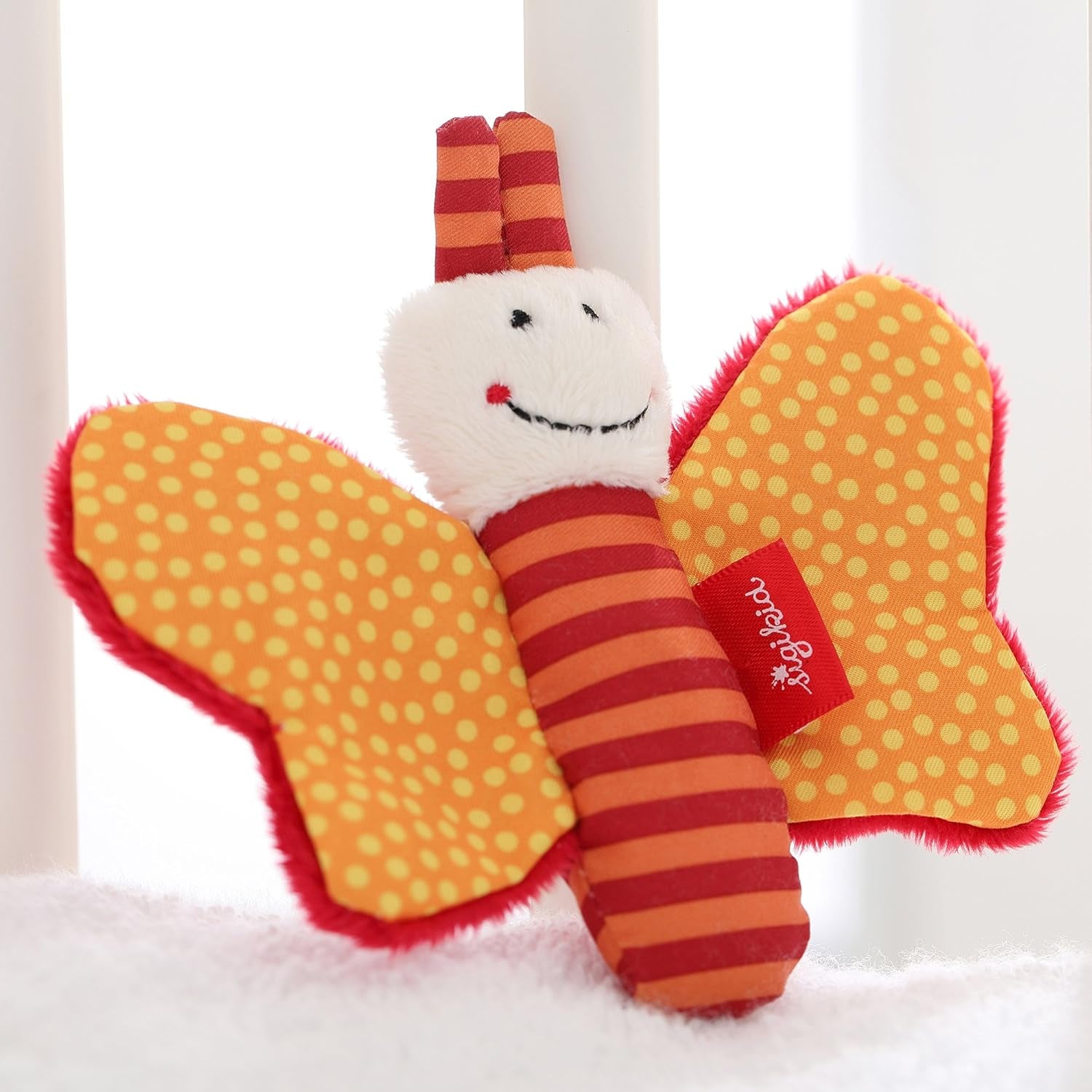 41174 Ratelslang Red Stars babyspeelgoed voor meisjes en jongens aanbevolen vanaf de geboorte bruin & 41181 Vlindervangspeelgoed Red Stars babyspeelgoed voor meisjes en jongens aanbevolen vanaf de geboorte oranje Bebe Naty Shop Speelgoed