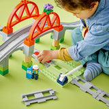 LEGO DUPLO Stadsspoorbrug en -rails - Uitbreidingsset, cadeau voor kinderen vanaf 2 jaar, bouw- en reconstructieset, voorschoolse ontwikkelingsset, educatief speelgoed 10426 Bouwsets Besuche den LEGO-Store