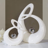GILDE Decoratieve keramische sculptuur Life - wit geglazuurd wit/zilveren figuur met zilveren bol - hoogte 22 cm Beeldjes en sculpturen Naty Shop