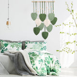 Handgemaakt wandkleed met houten kralen en groene bladeren Casa - Accessoires en Decoratie Naty Shop